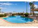 Sparkling community swimming pool with ample surrounding patio space at 1321 W Clear Spring Dr, Gilbert, AZ 85233