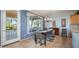 Bright dining area with table and chairs, featuring a view to the backyard at 13414 W Micheltorena Dr, Sun City West, AZ 85375