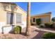 Landscaped pathway leads to the home's entrance at 13414 W Micheltorena Dr, Sun City West, AZ 85375