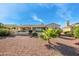 Single-story home with desert landscaping and covered patio at 13414 W Micheltorena Dr, Sun City West, AZ 85375
