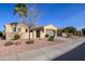 Residential home with two-car garage and front yard landscaping at 13414 W Micheltorena Dr, Sun City West, AZ 85375