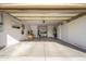 Garage with ample storage and workshop area at 13414 W Micheltorena Dr, Sun City West, AZ 85375