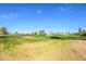 Expansive view of a beautifully maintained golf course at 13414 W Micheltorena Dr, Sun City West, AZ 85375