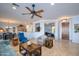 Open living space with seating area and access to kitchen at 13414 W Micheltorena Dr, Sun City West, AZ 85375