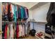 Spacious walk-in closet with ample hanging and shelving space at 13414 W Micheltorena Dr, Sun City West, AZ 85375