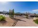 Landscaped walkway leading to a beautiful home with mountain views at 13829 N Sunflower Dr, Fountain Hills, AZ 85268