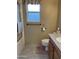 Simple bathroom with granite vanity and shower/tub combo at 16828 N 107Th Dr, Sun City, AZ 85351