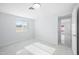 Well-lit bedroom with a window and marble-style floors at 1719 W Palomino Dr, Chandler, AZ 85224