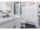 Clean bathroom with toilet, shower, and white vanity at 17329 W Gretna St, Surprise, AZ 85388