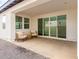 Relaxing covered patio with wicker chairs and a view at 17329 W Gretna St, Surprise, AZ 85388
