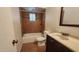 Bathroom with tub, toilet and vanity at 2601 E Virginia Ave, Phoenix, AZ 85008