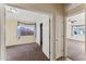 Well-lit bedroom with neutral carpeting and a closet at 2949 W Kristina Ave, San Tan Valley, AZ 85144