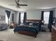 Bright bedroom with king-size bed and two windows at 4856 S Tune --, Mesa, AZ 85212