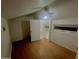 Bright bedroom featuring wood floors and access to an upper level at 4901 S Calle Los Cerros Dr # 202, Tempe, AZ 85282