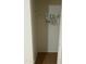 Simple closet with wood flooring and several hangers at 4901 S Calle Los Cerros Dr # 202, Tempe, AZ 85282