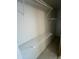 Large walk-in closet with wire shelving and hanging rods at 4901 S Calle Los Cerros Dr # 202, Tempe, AZ 85282