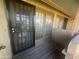 Private patio with a door and security gate at 4901 S Calle Los Cerros Dr # 202, Tempe, AZ 85282