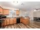 Kitchen with light wood cabinets, stainless steel appliances, and island at 5345 S Mill Ave, Tempe, AZ 85283