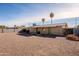 Backyard view of single story home with gravel and a patio at 5914 E Decatur St, Mesa, AZ 85205