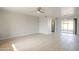 Living room with tile floors and ceiling fan at 5914 E Decatur St, Mesa, AZ 85205