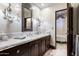 Spa-like bathroom with marble vanity and soaking tub at 6161 N 59Th Pl, Paradise Valley, AZ 85253