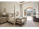Spacious bedroom with views and access to pool area at 6161 N 59Th Pl, Paradise Valley, AZ 85253