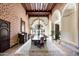 Elegant formal dining room featuring a large table, chandelier, and ornate decor at 6161 N 59Th Pl, Paradise Valley, AZ 85253