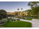 Luxury estate with lush landscaping and a long driveway at 6161 N 59Th Pl, Paradise Valley, AZ 85253