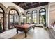 Game room featuring a pool table and large windows at 6161 N 59Th Pl, Paradise Valley, AZ 85253