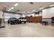 Spacious garage with ample room for cars, recreational vehicles, and storage at 6161 N 59Th Pl, Paradise Valley, AZ 85253
