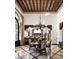 Open kitchen with a large island and breakfast bar, adjacent to dining area at 6161 N 59Th Pl, Paradise Valley, AZ 85253