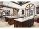 Large kitchen with double islands and high-end finishes at 6161 N 59Th Pl, Paradise Valley, AZ 85253