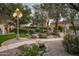 Landscaped pathway with water features and elegant lighting at 6161 N 59Th Pl, Paradise Valley, AZ 85253