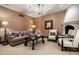 Bright living room with fireplace and comfortable seating at 6161 N 59Th Pl, Paradise Valley, AZ 85253