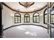 Bright office with high ceilings, dark wood accents and large windows at 6161 N 59Th Pl, Paradise Valley, AZ 85253