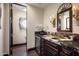 Wet bar with granite countertop and mini-refrigerator at 6161 N 59Th Pl, Paradise Valley, AZ 85253