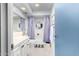Bathroom with a tub, shower, and black and white checkered curtains at 6317 E Pinchot Ave, Scottsdale, AZ 85251