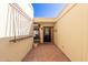 Front entry with decorative wrought iron and brick flooring at 6317 E Pinchot Ave, Scottsdale, AZ 85251