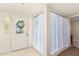 Interior entry with a glass door and white trim at 6317 E Pinchot Ave, Scottsdale, AZ 85251