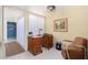 Home office featuring a vintage desk, comfortable chair, and natural light at 6317 E Pinchot Ave, Scottsdale, AZ 85251