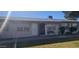 Condo building exterior with a walkway and bench at 849 N Revere St # B, Mesa, AZ 85201