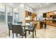 Bright breakfast nook with glass table and modern chairs at 8745 N 73Rd Way, Scottsdale, AZ 85258