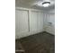 Bedroom with large closet and window at 9623 E Baywood Ave, Mesa, AZ 85208