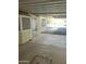 View from inside carport toward mobile home entrance at 9623 E Baywood Ave, Mesa, AZ 85208