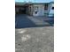 Gravel driveway leading to mobile home entrance at 9623 E Baywood Ave, Mesa, AZ 85208