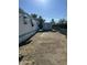 Mobile home with desert landscaping at 9623 E Baywood Ave, Mesa, AZ 85208