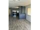 Renovated kitchen with modern appliances and gray cabinetry at 9623 E Baywood Ave, Mesa, AZ 85208