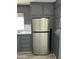Stainless steel refrigerator in updated kitchen at 9623 E Baywood Ave, Mesa, AZ 85208