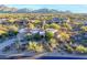 Stunning aerial view of a custom home with mountain backdrop at 10201 E Ranch Gate Rd, Scottsdale, AZ 85255