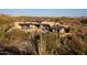 Luxury estate on a hillside with a pool at 11271 E Cinder Cone Trl, Scottsdale, AZ 85262